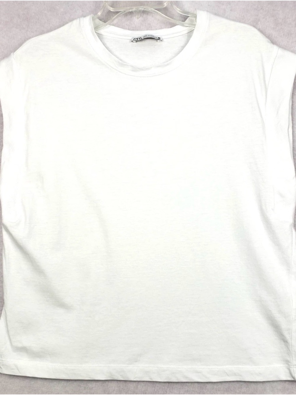 Zara Sleeveless Tee Top
Women's Size M White
Extended Shoulder Style